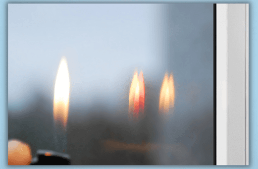 Checking energy-efficient glass with the flame of a lighter