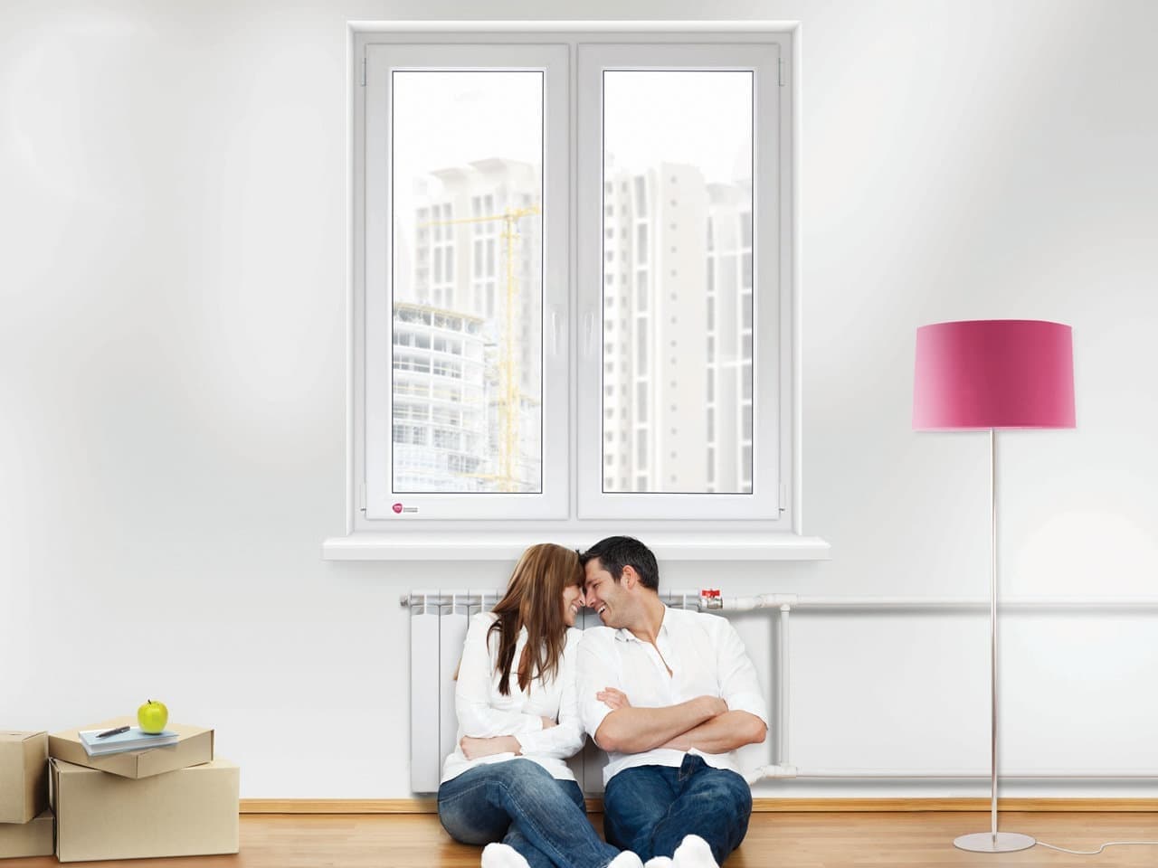 Couple by a VALENT PVC window