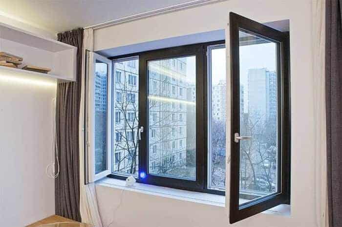 PVC window with shutters on a European facade